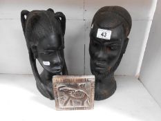 2 antique tribal busts of a man & woman