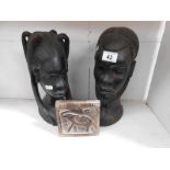 2 antique tribal busts of a man & woman