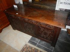 A carved oak chest