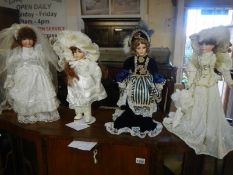 4 bisque head collectors dolls