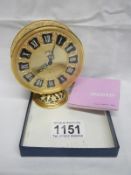 A Jaegar Recital gilt brass table clock