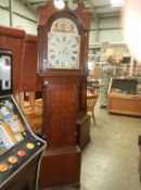 A Victorian 8 day long case clock with arch painted face (no weights or bell)