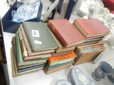 A quantity of old books including some first editions, including Dante the inferno,