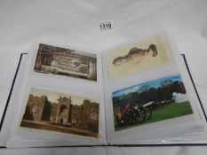 An album of approximately 200 various GB and world postcards, topographical, people,