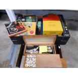 A box of old games including Trivial Pursuit,