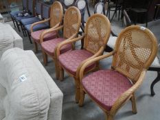 A set of 4 wicker & cane conservatory chairs