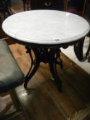 A marble topped mahogany base pub table