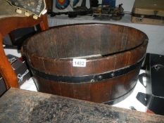 A Victorian oval wooden bucket