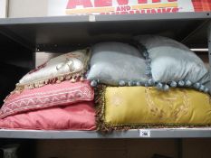 A quantity of of cushions including silk embroidered