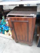 A quantity of LP & 45rpm records in a Victorian mahogany converted pot cupboard