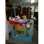 A 3 little pigs puppet string theatre