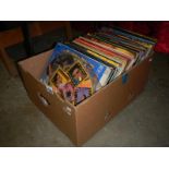 A box of LP records including picture discs
