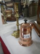 A Georgian brass petal base candlestick c1760 and a copper army and navy tankard