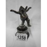 A silver plated Skegness souvenir fisherman figure on base