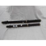 2 woodwind instruments (piccolos)