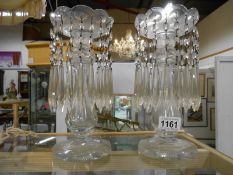 A pair of clear glass lustres