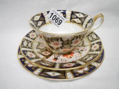 A Royal Crown Derby Old Imari pattern 2451 trio