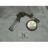 A silver ingot with silver chain & a 1977 Silver Jubilee crown in silver mount with chain 70 gms