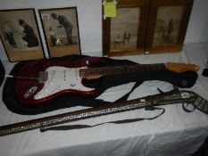 An electric guitar,