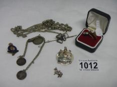 A mixed lot of jewellery including ring, badges,