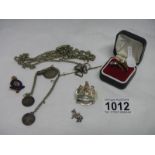 A mixed lot of jewellery including ring, badges,