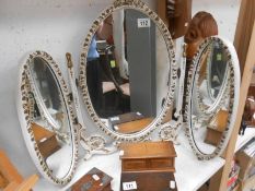 A shabby chic painted triple oval dressing table mirror