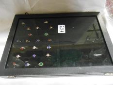 A jewellery case and 20 stone set silver rings