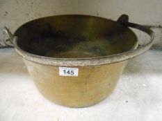 A Victorian brass jam pan