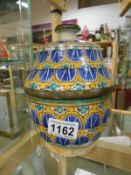 An old Islamic lidded bowl inscribed on bottom FES.R.A.
