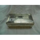 A silver cased cigarette box,