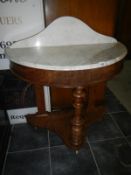 A Victorian marble topped 'D' end wash stand