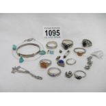 A mixed lot of silver rings and other white metal jewellery