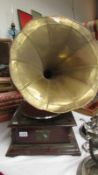 A reproduction HMV His Masters Voice horn gramaphone with brass horn