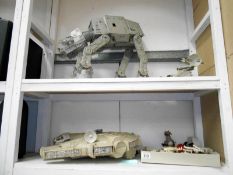 A collection of Star Wars figures & vehicles