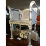 A silver painted chair