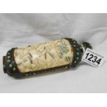 An antique carved ivory and bronze Chinese scent bottle depicting battle scenes, approx. height 16.