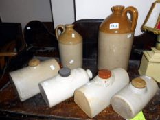 2 stoneware jugs and 4 stoneware warmers