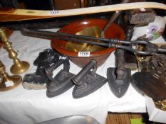 A mixed lot of irons, brass saucepan, fire tongs etc