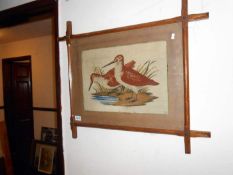 A framed and glazed tapestry picture of birds