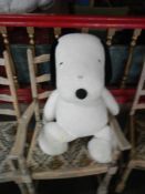 A large Snoopy soft toy