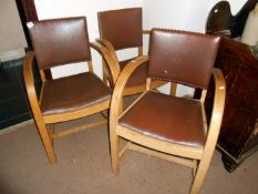 2 wooden chairs with leather seats and backs, with curved arms