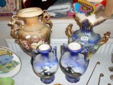 A pair of Victorian vases and 2 other vases