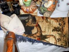 A table runner and a tapestry