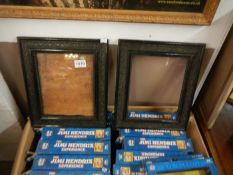 A pair of old picture frames