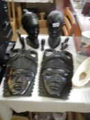 A quantity of old wooden masks etc