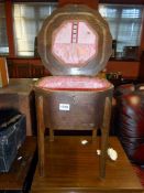 A wooden sewing table with lift up lid