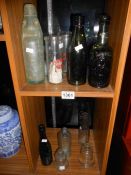 A quantity of mixed bottles etc. Some with advertising