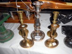 2 pairs of brass candlesticks and one other