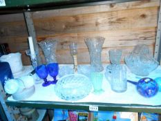 A shelf of glassware