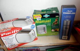 A toaster, cat flap and flask (all boxed)